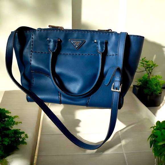 Prada Handbags - Authentic Prada blue city external suture calfskin twin pocket bag with strap